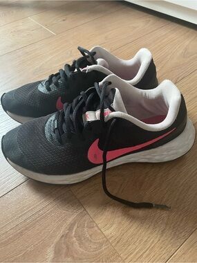 Nike Black Athletic Shoes with Pink Logo